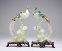 A PAIR OF 20TH CENTURY CHINESE CARVED SERPENTINE PHOENIXES