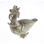 AN INDIAN PATINATED METAL MODEL OF A GARUDA BIRD