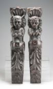 A PAIR OF 19TH CENTURY CARVED OAK CORBELS