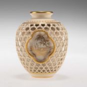 AN EARLY 20TH CENTURY ROYAL WORCESTER DOUBLE WALLED RETICULATED VASE