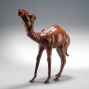 A 20TH CENTURY LIBERTY STYLE LEATHER CLAD MODEL OF A CAMEL