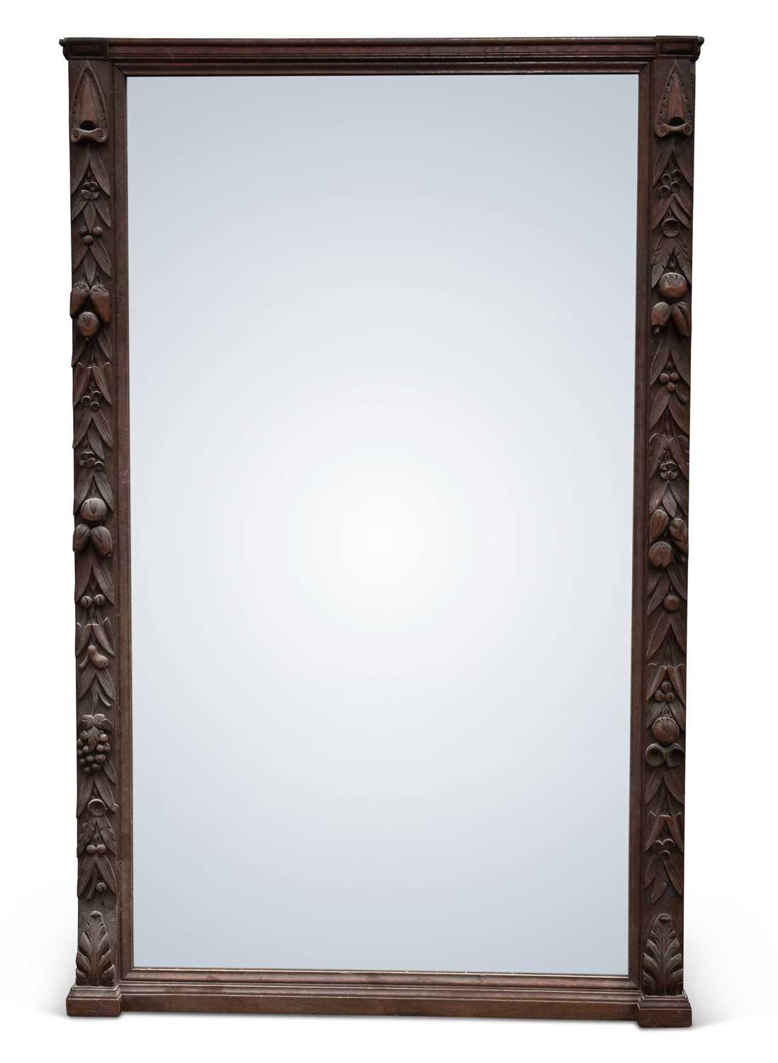 A VICTORIAN CARVED OAK OVERMANTEL MIRROR