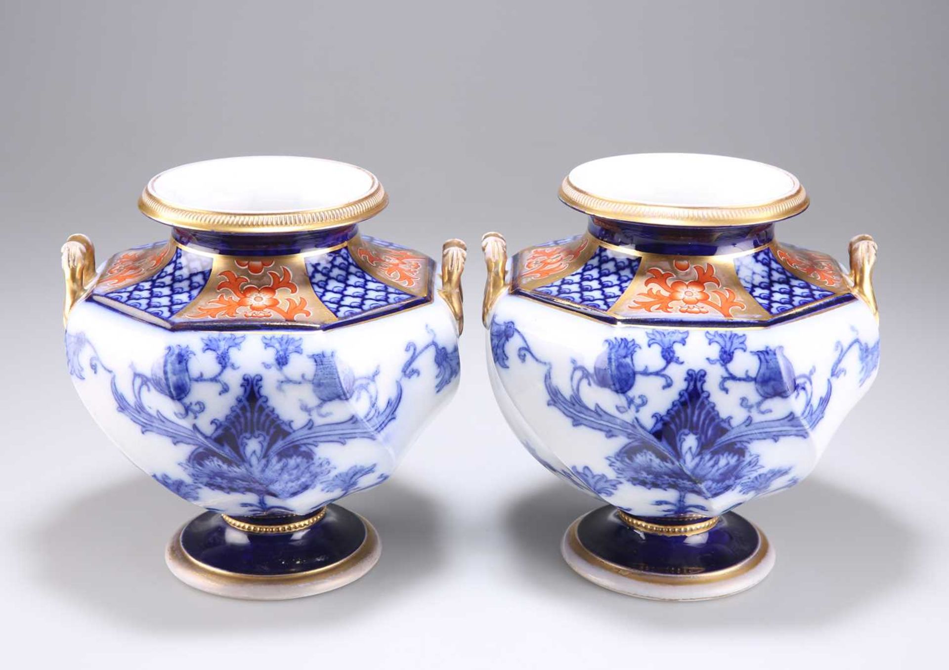 A PAIR OF LATE 19TH CENTURY JAMES MACINTYRE & CO BURSLEM AURELIAN WARE PEDESTAL VASES