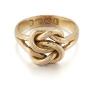A VICTORIAN 18 CARAT GOLD LOVER'S KNOT RING