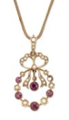 A LATE 19TH / EARLY 20TH CENTURY GARNET AND SEED PEARL PENDANT ON CHAIN
