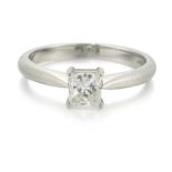 A PLATINUM PRINCESS-CUT SOLITAIRE DIAMOND RING