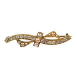 A LATE 19TH CENTURY DIAMOND AND PEARL BAR BROOCH