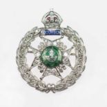 A RAJPUTANA RIFLES DIAMOND AND ENAMEL REGIMENTAL BROOCH