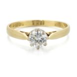 AN 18 CARAT GOLD SOLITAIRE DIAMOND RING