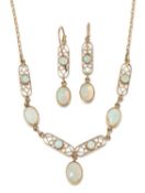 A 9 CARAT GOLD OPAL NECKLACE AND EARRING SET