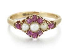 A VICTORIAN SPLIT PEARL AND RUBY CLUSTER RING