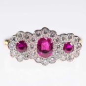 A RUBY AND DIAMOND TRIPLE CLUSTER RING