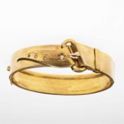 A LATE 19TH CENTURY SEED PEARL HINGE OPENING GARTER BANGLE