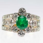 A FRENCH 18 CARAT GOLD EMERALD AND DIAMOND CLUSTER RING