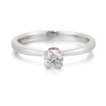 AN 18 CARAT WHITE GOLD SOLITAIRE DIAMOND RING