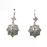 A PAIR OF DIAMOND CLUSTER PENDANT EARRINGS