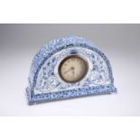 AN AESTHETIC MOVEMENT BLUE TRANSFER-PRINTED MANTEL CLOCK, CIRCA 1880