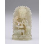 A CHINESE JADE CARVING OF A DEITY