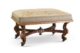 A 19TH CENTURY WALNUT, PARCEL-GILT AND UPHOLSTERED STOOL, LABELLED CONSTANTINE & CO, LEEDS