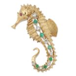 AN EMERALD, DIAMOND AND RUBY SEAHORSE BROOCH