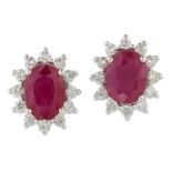 A PAIR OF RUBY AND DIAMOND CLUSTER EARRINGS