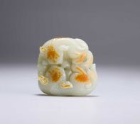 A CHINESE JADE CARVING OF LION DOGS