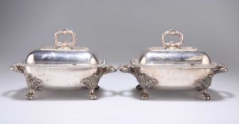 A PAIR OF 19TH CENTURY SILVER-PLATED SAUCE TUREENS AND COVERS