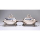 A PAIR OF 19TH CENTURY SILVER-PLATED SAUCE TUREENS AND COVERS