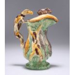 A MAJOLICA HUNTING JUG AND COVER, LAST QUARTER 19TH CENTURY