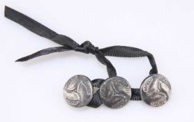 ARCHIBALD KNOX (1864-1933) FOR LIBERTY & CO, THREE SILVER CYMRIC BUTTONS