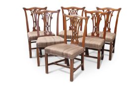 A SET OF SIX GEORGE III 'CHIPPENDALE' MAHOGANY DINING CHAIRS