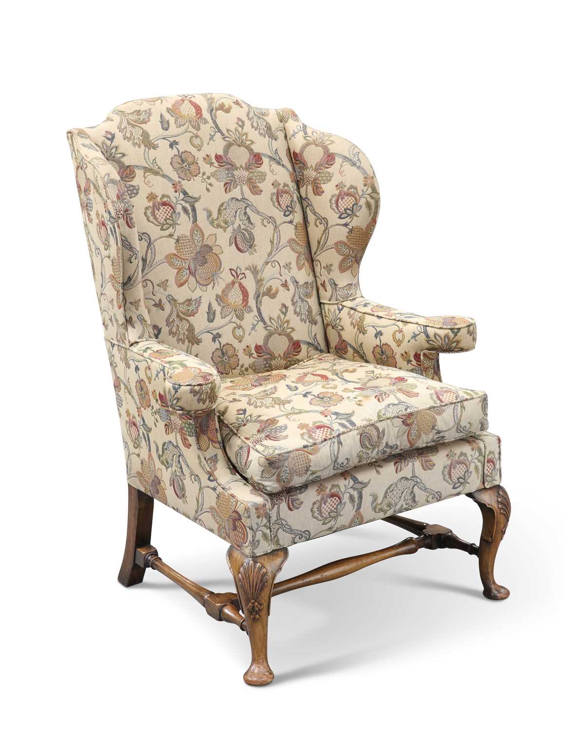 A GEORGE II STYLE WALNUT WING-BACK ARMCHAIR, BY PETER SILK OF HELMSLEY