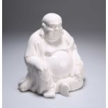 A CHINESE CRACKLE-GLAZED FIGURE OF SEATED BUDDHA