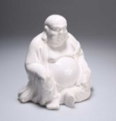 A CHINESE CRACKLE-GLAZED FIGURE OF SEATED BUDDHA