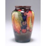 A MOORCROFT FLAMBÉ 'LEAF AND BERRY' PATTERN POTTERY VASE