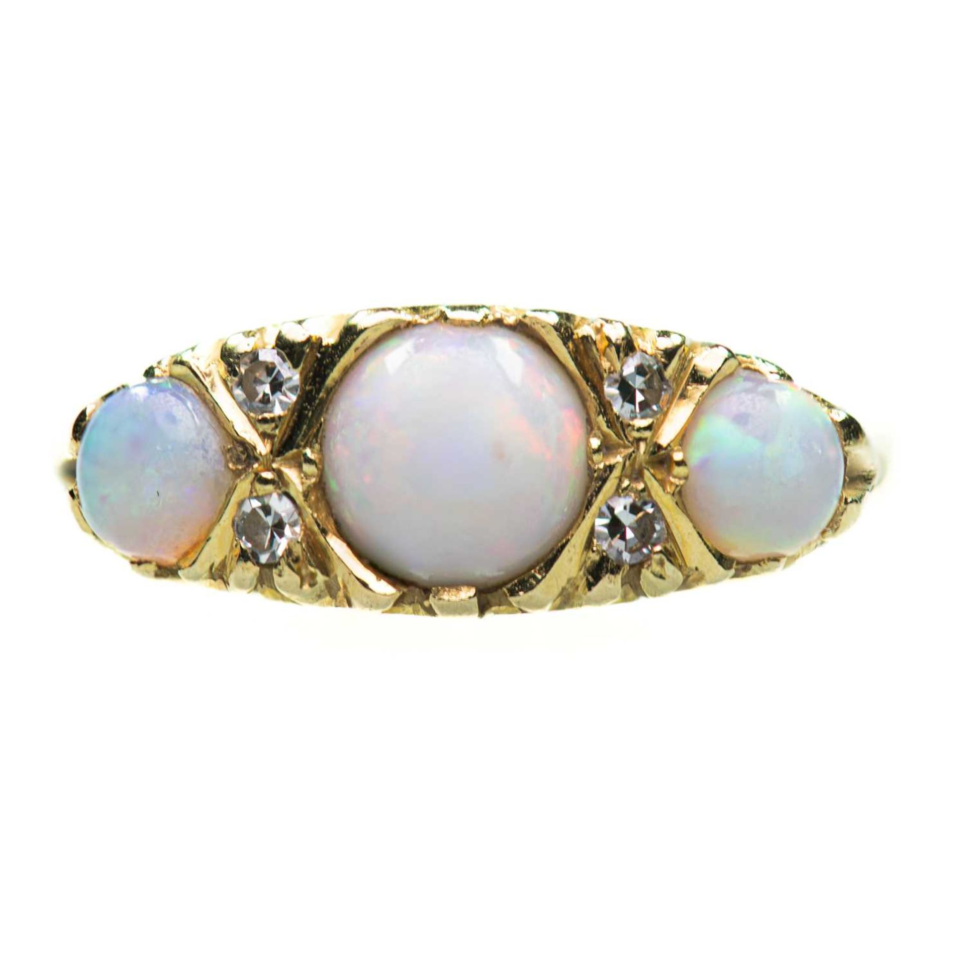 AN 18 CARAT GOLD OPAL AND DIAMOND RING