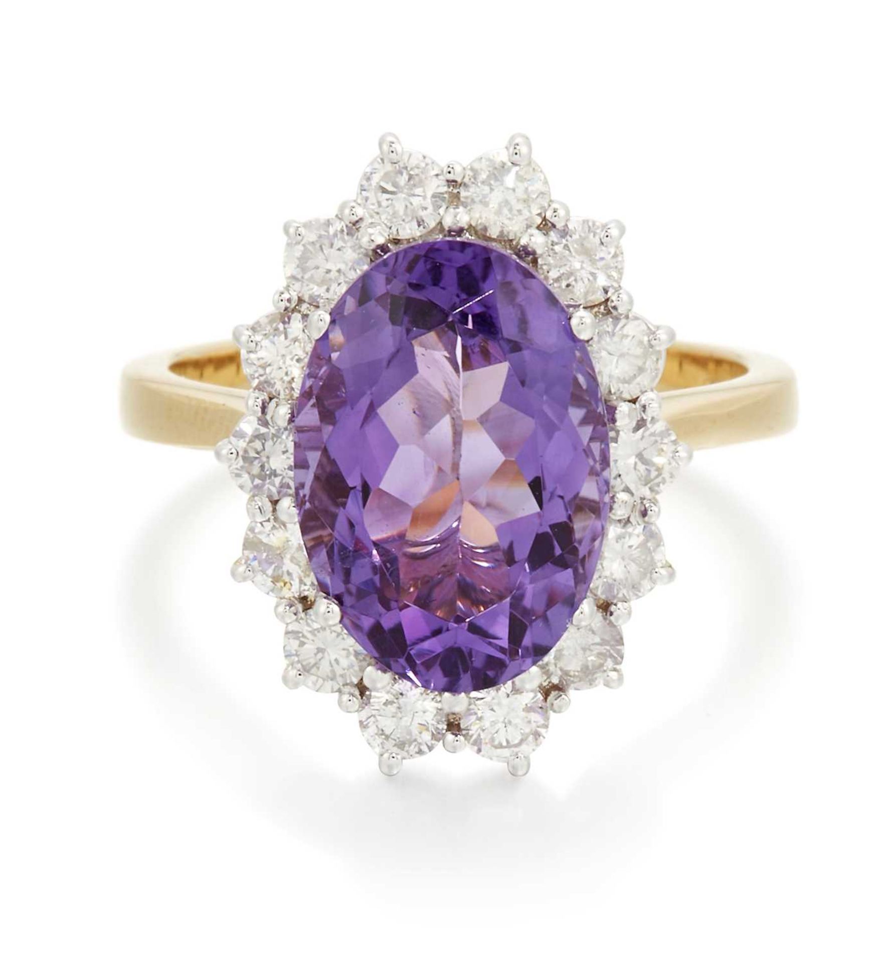 AN 18 CARAT GOLD AMETHYST AND DIAMOND CLUSTER RING