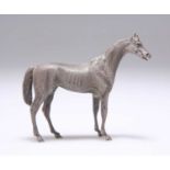 AN ELIZABETH II CAST SILVER MODEL OF A HORSE