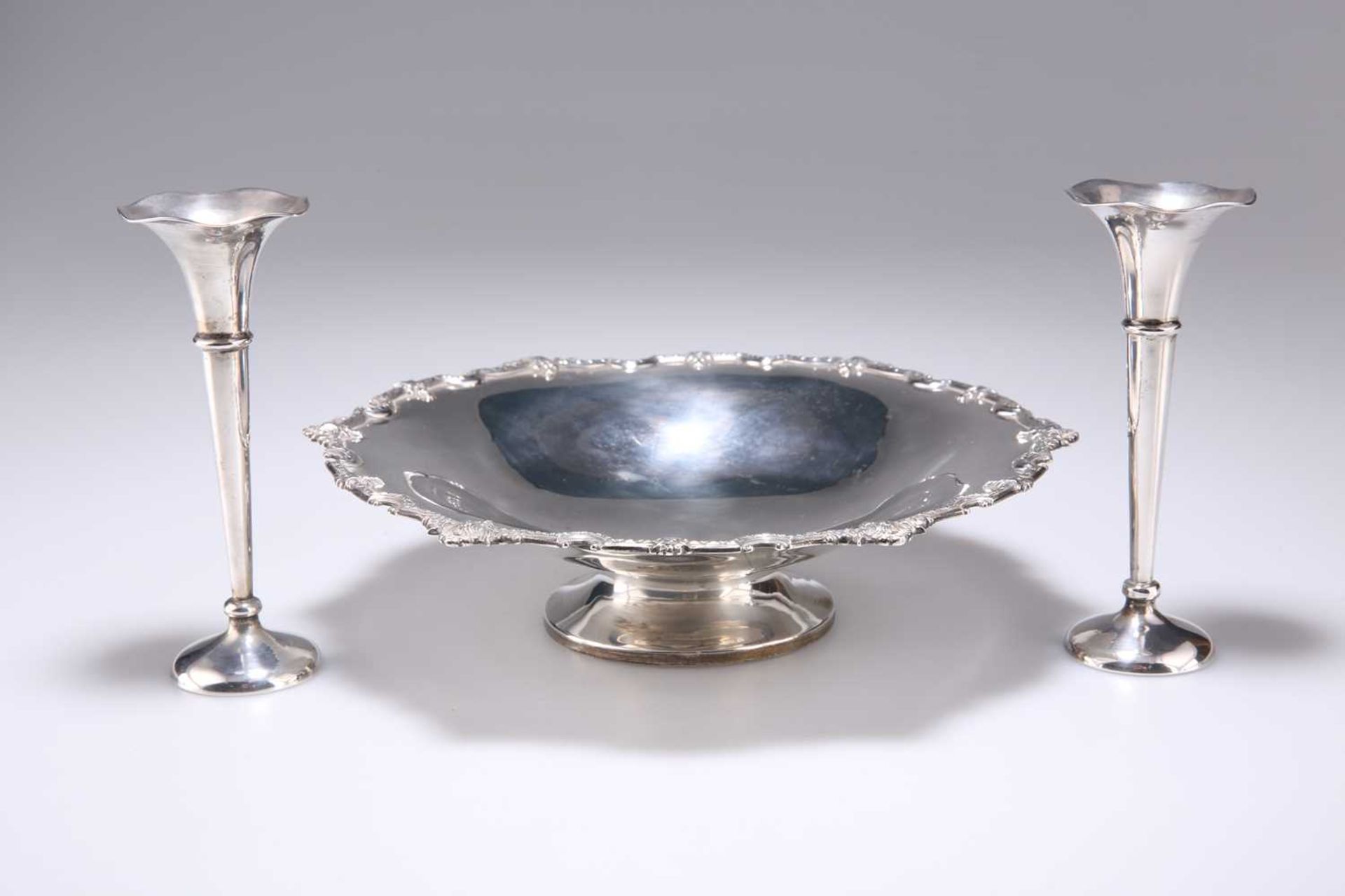 A SILVER DISH AND A PAIR OF CONTINENTAL SILVER BUD VASES