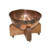 A VICTORIAN LARGE COPPER TWO-HANDLED PAN ON STAND