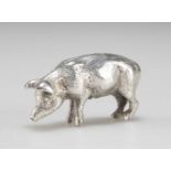 A CAST SILVER MODEL OF A PIG