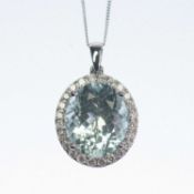 AN 18 CARAT WHITE GOLD AQUAMARINE AND DIAMOND CLUSTER PENDANT ON CHAIN