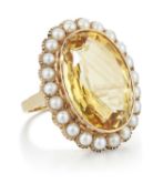 A LARGE CITRINE AND SPLIT PEARL CLUSTER RING