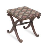 A REGENCY MAHOGANY X-FRAMED STOOL, IN THE MANNER OF GILLOWS