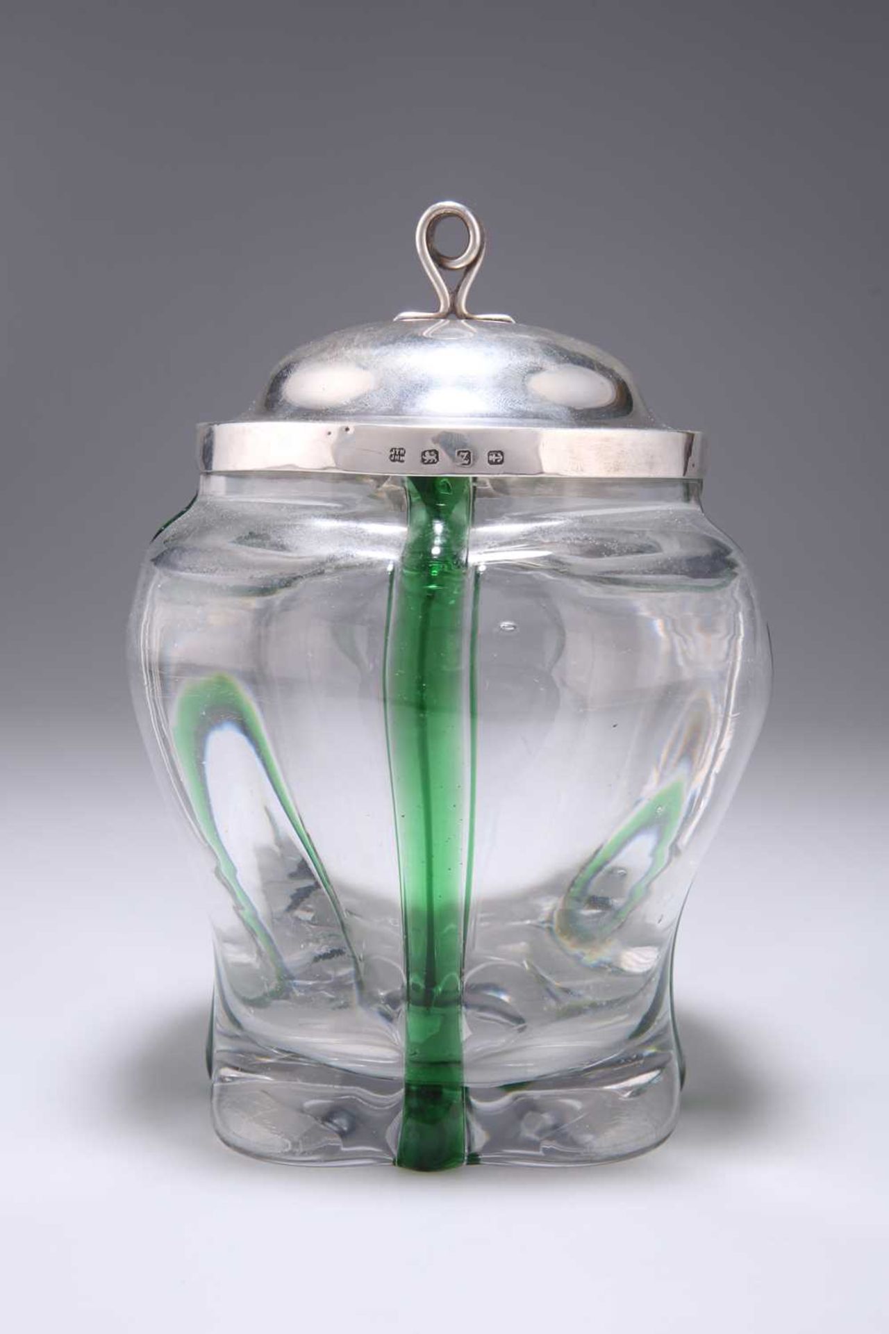 AN ARTS AND CRAFTS SILVER-TOPPED GLASS BISCUIT BOX