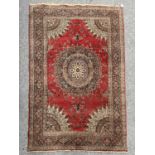 AN ANTIQUE PERSIAN RUG