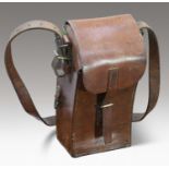 A BRASS-MOUNTED LEATHER GUN MAGAZINE CASE