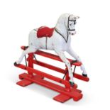 A VINTAGE PAINTED WOODEN ROCKING HORSE