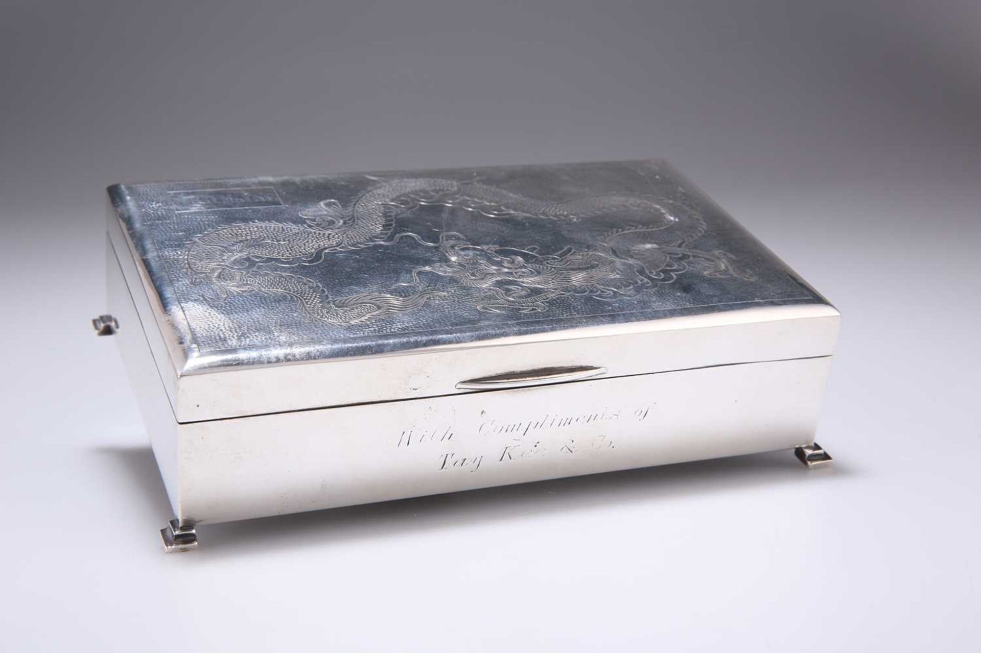 A CHINESE STERLING SILVER CIGARETTE BOX