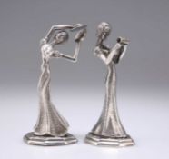 A PAIR OF SILVER FIGURES